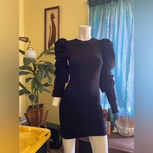Ladies black sweater mini dress with puffy sleeves and button up sleeves mod